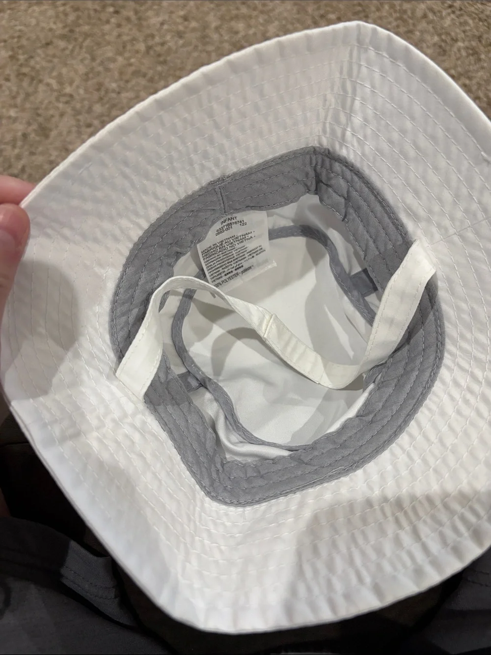 Nike White Bucket Hat with Black Swoosh Logo